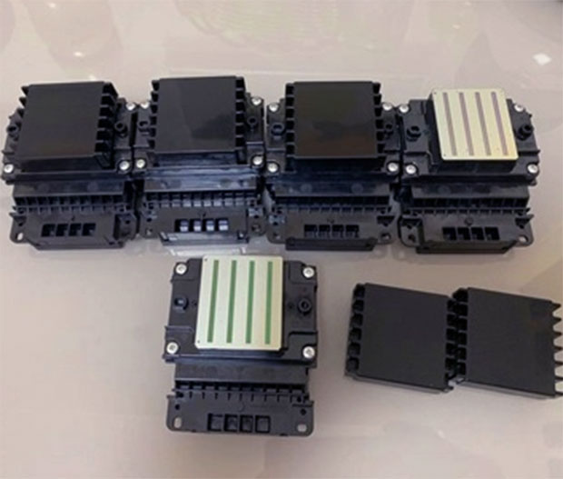 數(shù)碼印花機(jī)選擇單噴頭還是雙噴頭?